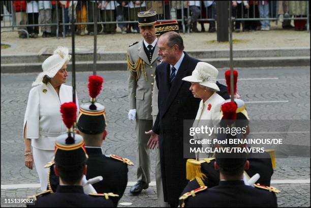 Queen Elizabeth II of Britain on 3-day visit in France to mark the centennial of the "Entente Cordiale" : Parade on the Champs-Elysees in Paris,...