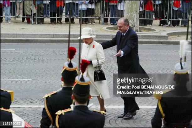 Queen Elizabeth II of Britain on 3-day visit in France to mark the centennial of the "Entente Cordiale" : Parade on the Champs-Elysees in Paris,...