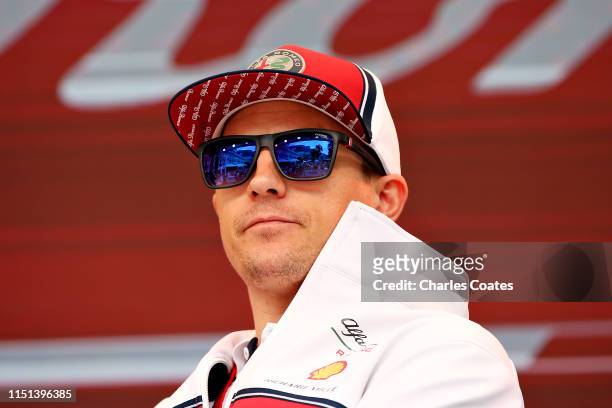 Kimi Raikkonen of Finland and Alfa Romeo Racing looks on from the fan stage during previews ahead of the F1 Grand Prix of Monaco at Circuit de Monaco...