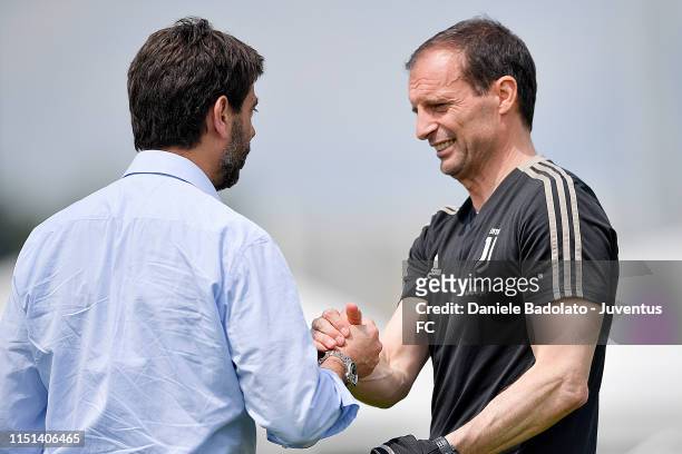 Juventus coach Massimiliano Allegri greets chairman Andrea Agnelli during a training session at JTC on May 24, 2019 in Turin, Italy.