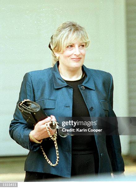 Linda Tripp leaves her Columbia, Maryland home to appear at a federal courthouse before a Washington grand jury for the fifth time July 14th, 1998....