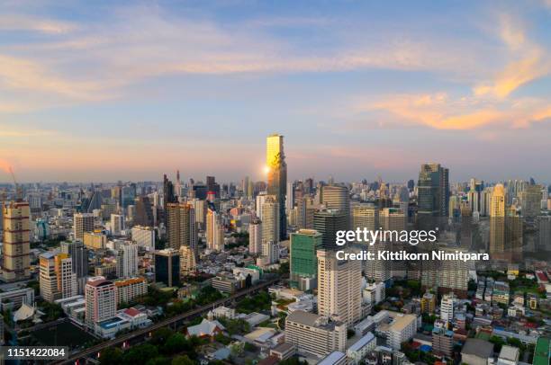 aerial view of bangkok modern office buildings, condominium, living place in bangkok city downtown with sunset scenery, bangkok is the most populated city in southeast asia.bangkok , thailand - bangkok aerial stock pictures, royalty-free photos & images