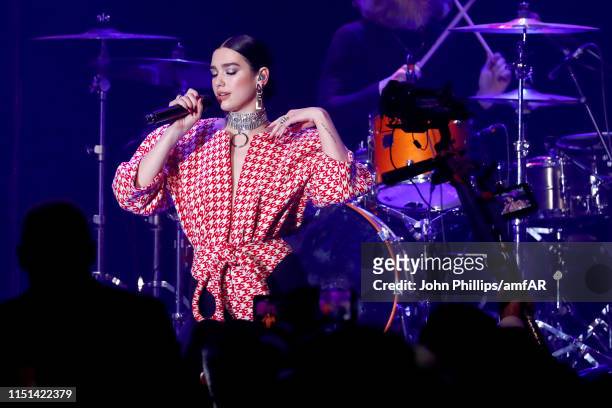Dua Lipa performs at the amfAR Cannes Gala 2019 at Hotel du Cap-Eden-Roc on May 23, 2019 in Cap d'Antibes, France.