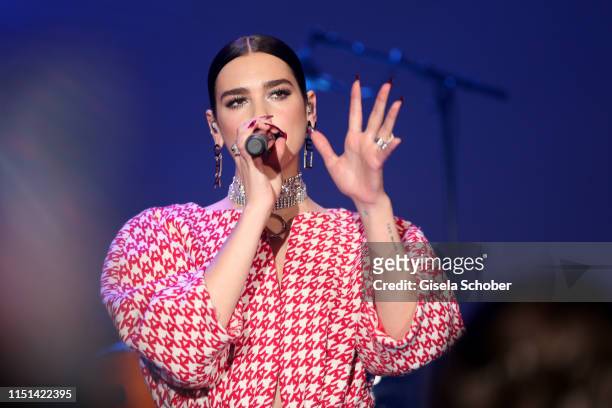 Dua Lipa performs at the amfAR Cannes Gala 2019 at Hotel du Cap-Eden-Roc on May 23, 2019 in Cap d'Antibes, France.