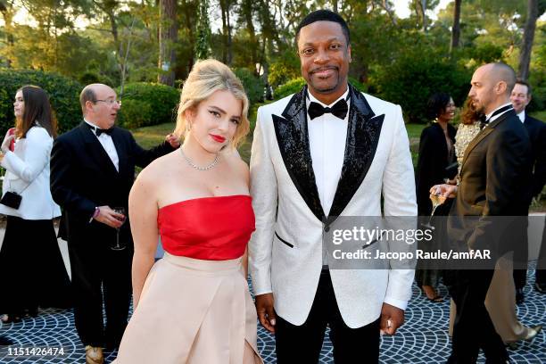 Renée Willett and Chris Tucker attends the amfAR Cannes Gala 2019 at Hotel du Cap-Eden-Roc on May 23, 2019 in Cap d'Antibes, France.