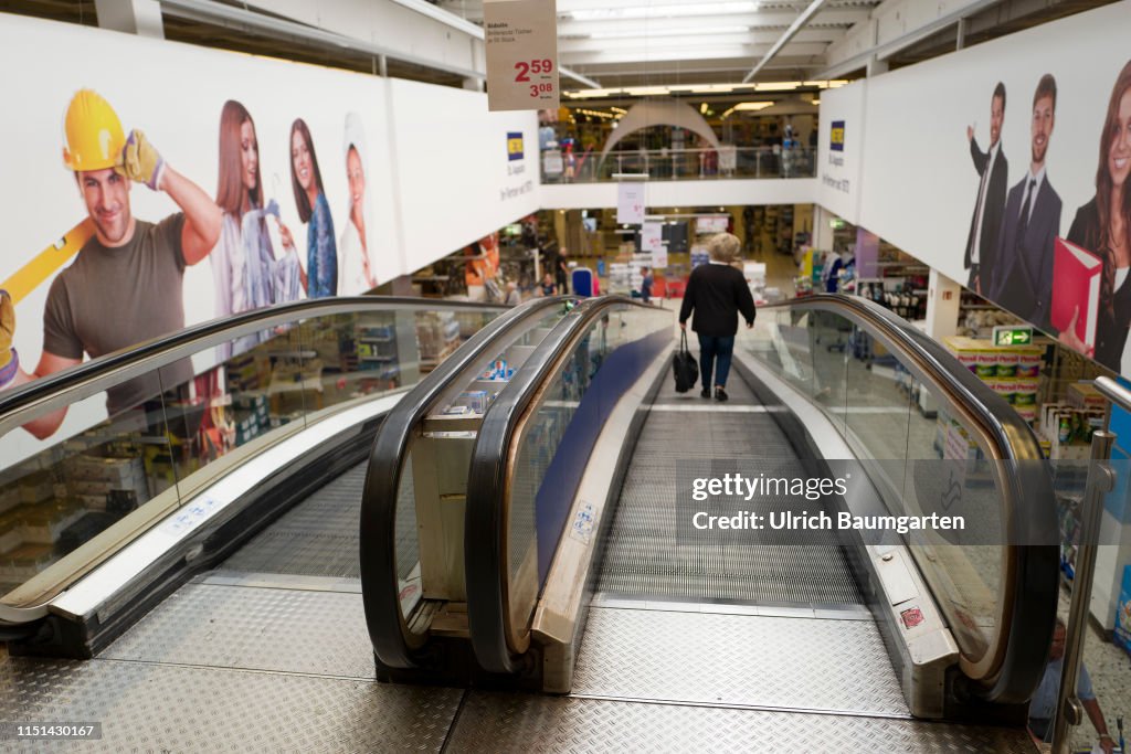 Takeover speculations - the Metro AG in trouble. The escalator of a branch of Metro AG during the normal opening hours.