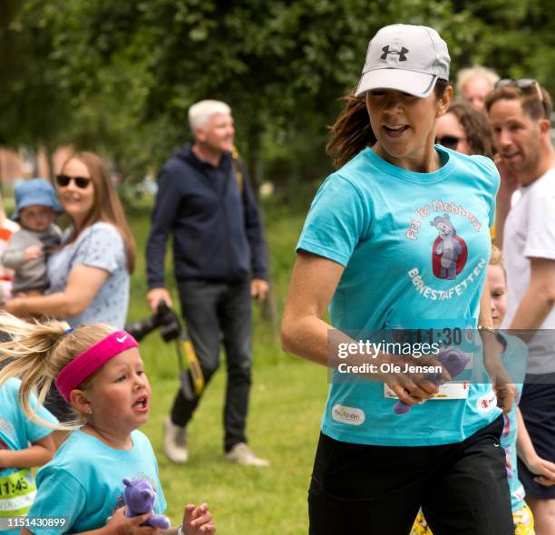 Crown Princess Mary of Denmark seen at the relay run for children held by The Mary Foundation and Save The Children on June 22, 2019 in Copenhagen,...