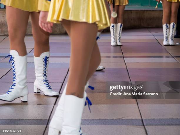 girls with white boots in a majorettes performance in salamanca - drum majorette stock pictures, royalty-free photos & images