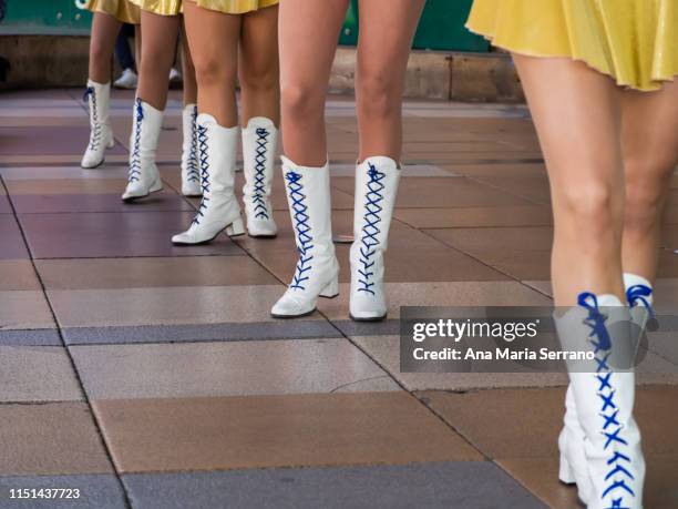 girls with white boots in a majorettes performance in salamanca - drum majorette stock pictures, royalty-free photos & images