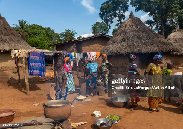 African women cooking in a village, Bafing, Gboni, Ivory Coast on May 5, 2019 in Gboni, Ivory Coast.