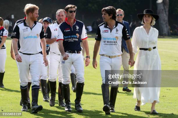 Harry, Duke of Sussex of Team Sentebale St Regis, Michael Carrazza of Team Sentebale St Regis, Malcolm Borwick of Team U.S Polo Assn and Nacho...