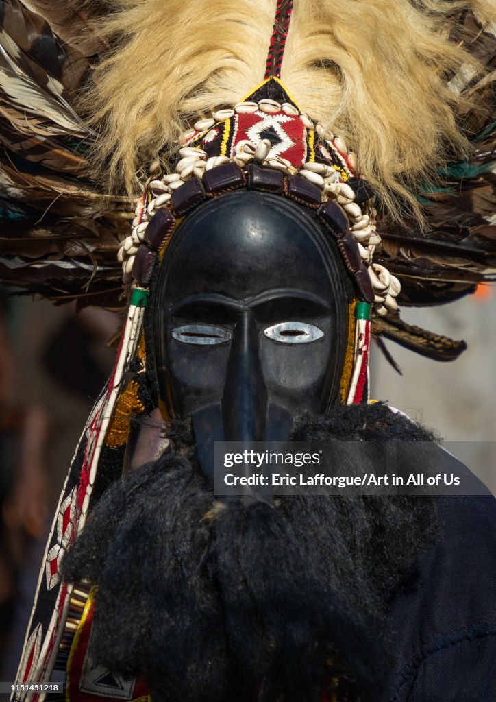 Dan tribe mask sacred dance during a ceremony, Bafing, Gboni, Ivory Coast...