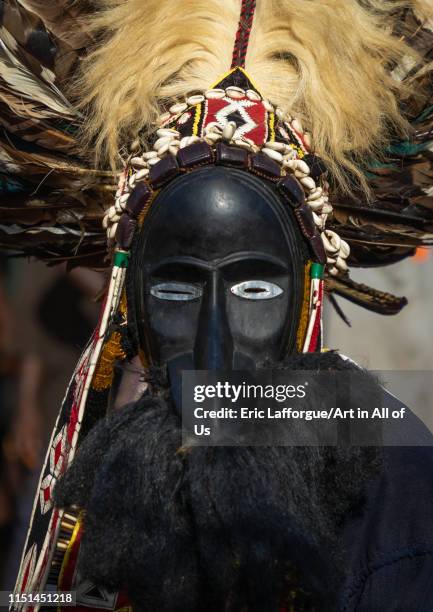 Dan tribe mask sacred dance during a ceremony, Bafing, Gboni, Ivory Coast on May 5, 2019 in Gboni, Ivory Coast.