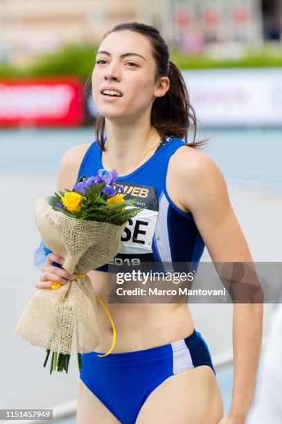 Alessia Pavese poses after winning the women's 200m final race during the Riunione Italiana di Velocità athletic meeting in Rieti, Italy.