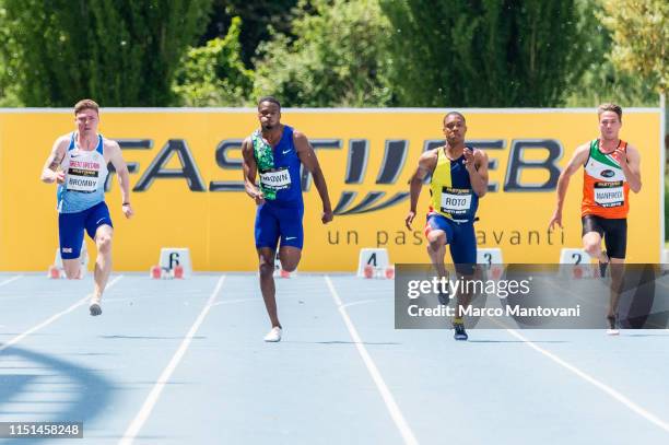 Oliver Bromby, Aaron Brown, Thando Roto and Thomas Manfredi compete in the men's 100m heat race during the Riunione Italiana di Velocità athletic...