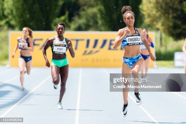 Ama Pipi and Maria Benedict Chigbolu compete in the women's 400m final race during the Riunione Italiana di Velocità athletic meeting in Rieti, Italy.