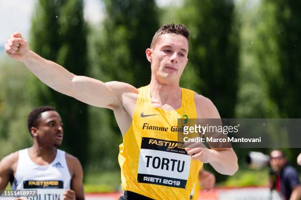 Filippo Tortu celebrates after winning the men's 100m heat race during the Riunione Italiana di Velocità athletic meeting in Rieti, Italy.