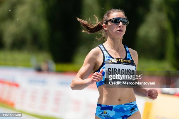 Irene Siragusa competes in the women's 100m heat race during the Riunione Italiana di Velocità athletic meeting in Rieti, Italy.