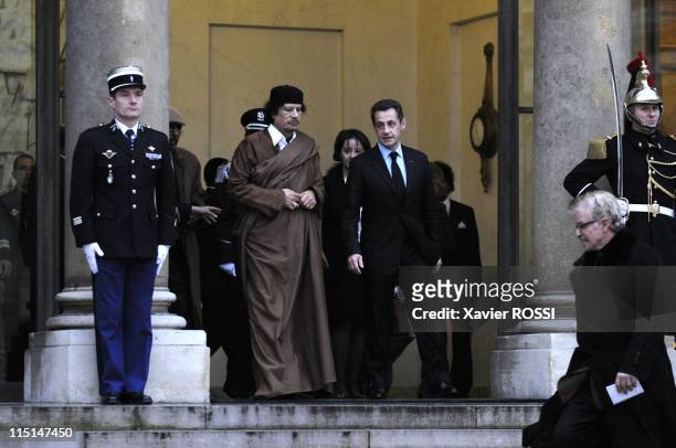 French president Nicolas Sarkozy welcomes Libyan leader Moamer Kadhafi at the French Elysee Palace in Paris, France on December 10, 2007 - French...
