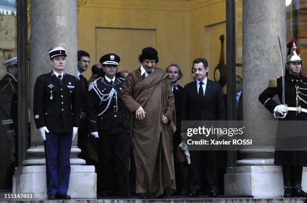 French president Nicolas Sarkozy welcomes Libyan leader Moamer Kadhafi at the French Elysee Palace in Paris, France on December 10, 2007 - French...