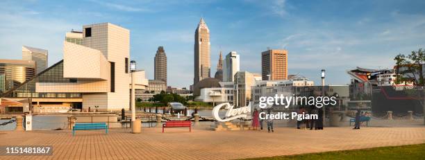 downtown cleveland panoramic city skyline in ohio usa - rock and roll hall of fame cleveland stock pictures, royalty-free photos & images