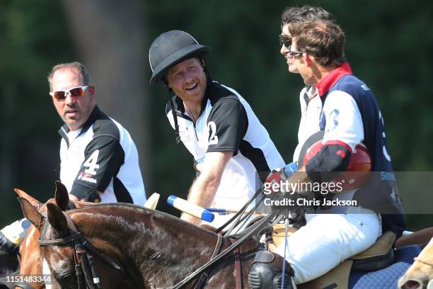 Michael Carrazza and Harry, Duke of Sussex chat after the Sentebale ISPS Handa Polo Cup between Team U.S Polo Assn and Team Sentebale St Regis, at...