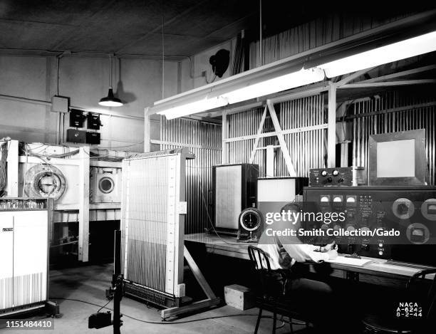 Engineer at the 1 x 3.5-Foot High-Speed Tunnel's test chamber at Ames Research Center, Mountain View, California, 1944. Image courtesy National...