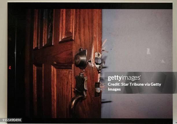 Photo of the front door that was kicked in when Jake Patterson entered the Closs house was displayed by the prosecution at the sentencing of Jake...