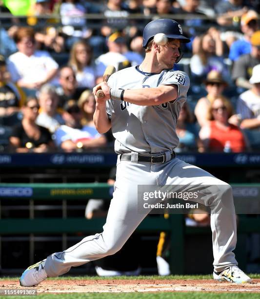 Wil Myers of the San Diego Padres ducks out of the way of a pitch throw by Chris Archer of the Pittsburgh Pirates in the second inning during the...