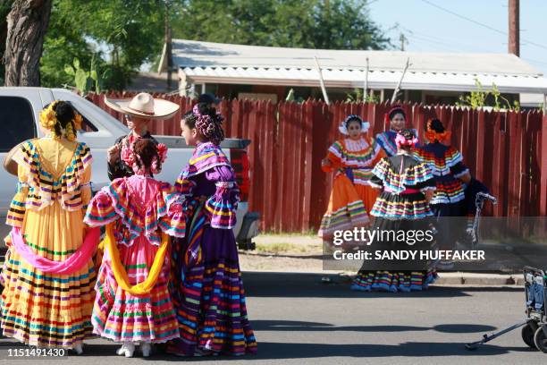 Ballet Folklorico dancers prepare to march in a homecoming parade for Heavyweight boxing champion Andy Ruiz Jr. On June 22, 2019 in Imperial,...