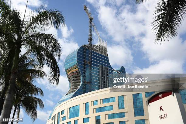 The guitar-shaped 400-foot-tall Hard Rock Hotel is seen as it is under construction on May 24, 2019 in Hollywood, Florida. The 638-room hotel is part...