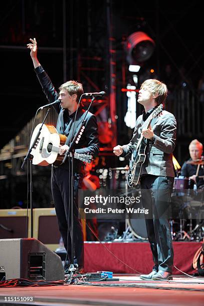 Gustav Noren and Bjorn Dixgard of Mando Diao perform on stage during the first day of Rock Am Ring on June 03, 2011 in Nuerburg, Germany.