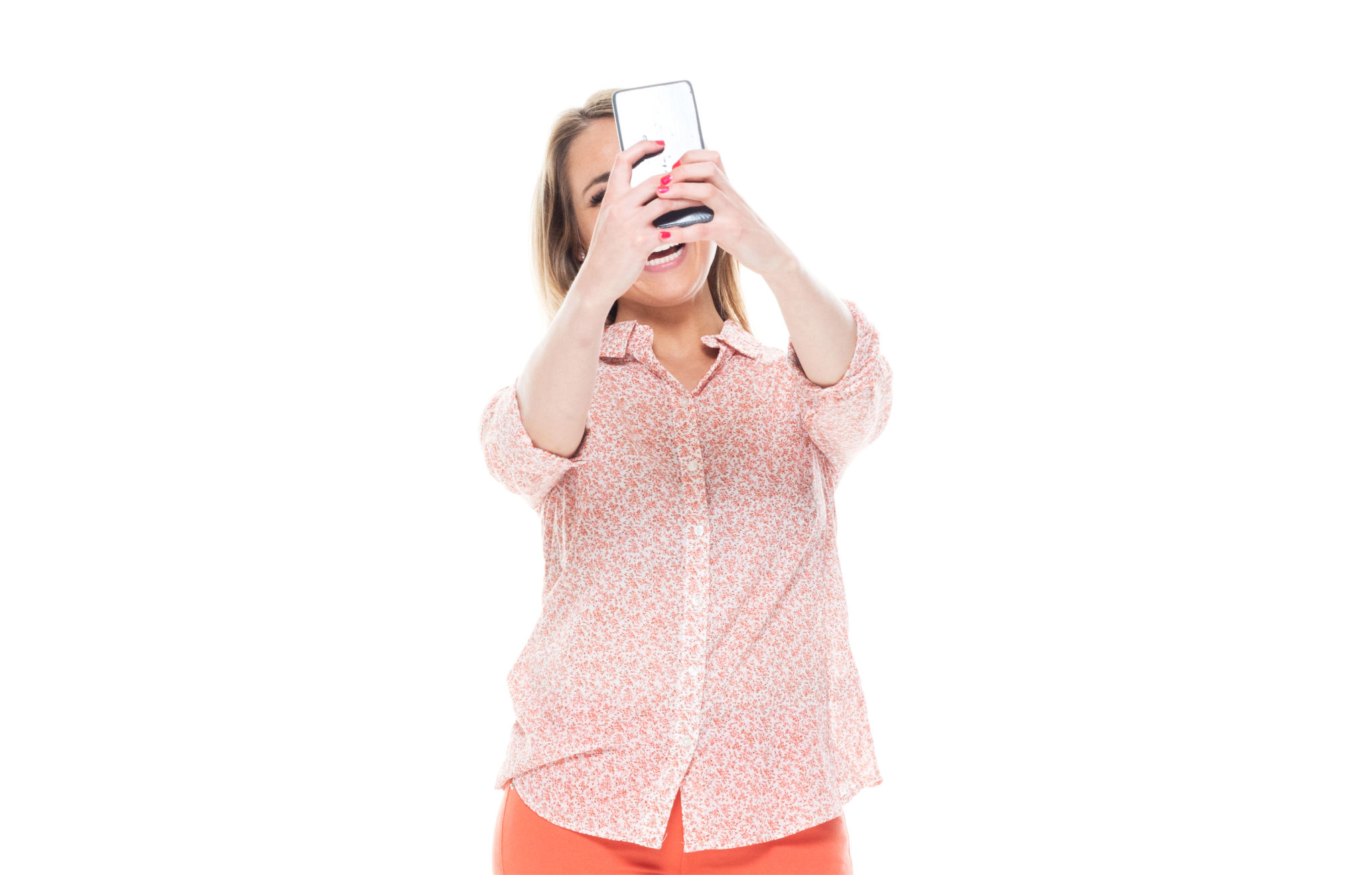 Good looking white female standing on white background - taking a selfie Good looking white female standing on white background - taking a selfie