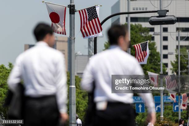 And Japanese national flags are displayed on a street on May 25, 2019 in Tokyo, Japan. U.S President Donald Trump will arrive later today for a...