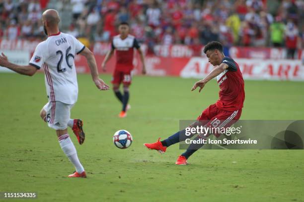 Dallas midfielder Brandon Servania kicks the ball during the game between FC Dallas and Toronto FC on June 22, 2019 at Toyota Stadium in Frisco, TX.