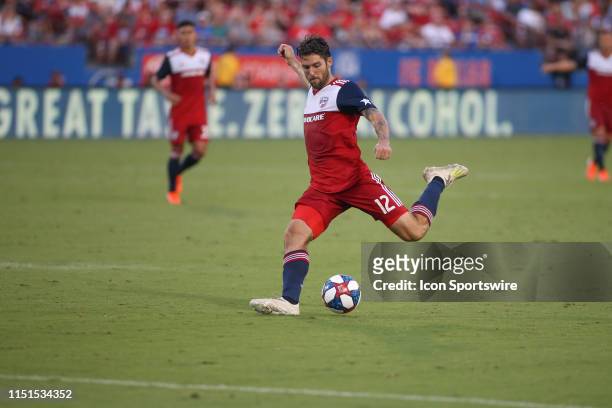 Dallas midfielder Ryan Hollingshead kicks the ball during the game between FC Dallas and Toronto FC on June 22, 2019 at Toyota Stadium in Frisco, TX.