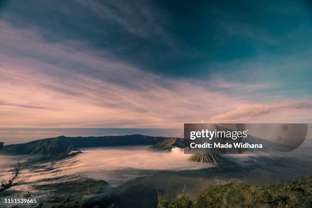 sunrise mood over the mount bromo - made widhana stock pictures, royalty-free photos & images