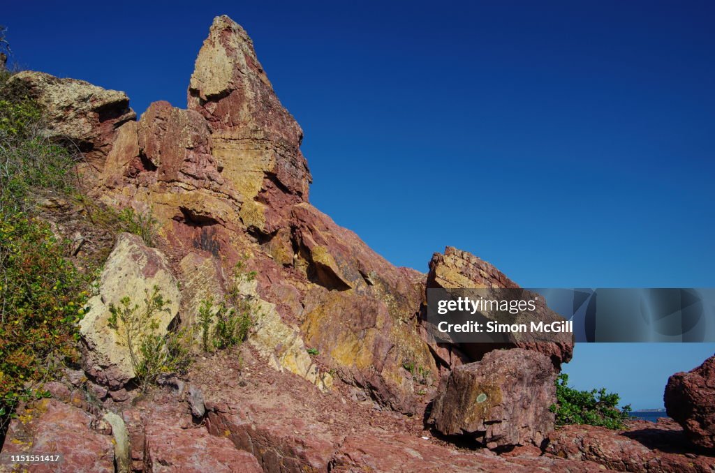 Cliff rock formations near Bar Beach, Merimbula, New South Wales, Australia