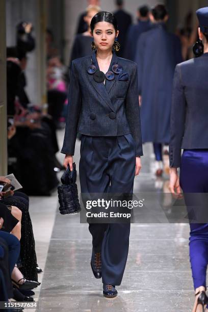 Model walks the runway during the Giorgio Armani Cruise 2020 Collection at the Tokyo National Museum on May 24, 2019 in Tokyo, Japan.