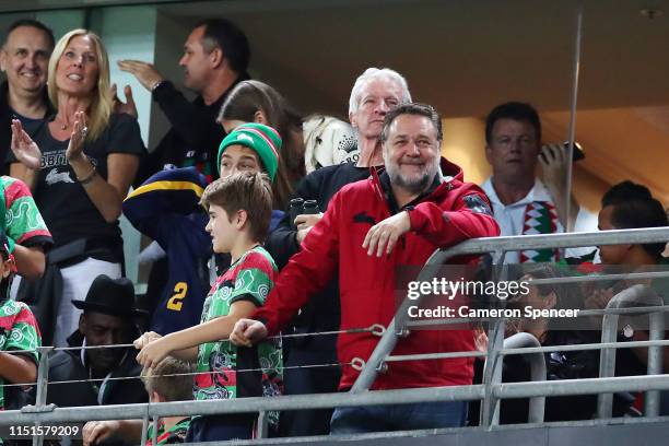 Rabbitohs co-owner Russell Crowe enjoys the atmosphere during the round 11 NRL match between the South Sydney Rabbitohs and the Wests Tigers at ANZ...