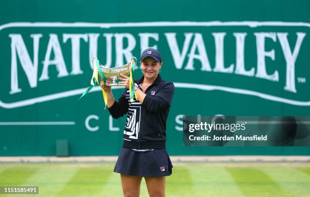 Ashleigh Barty of Australia poses with the trophy following her victory in the final match during day seven of the Nature Valley Classic at Edgbaston...