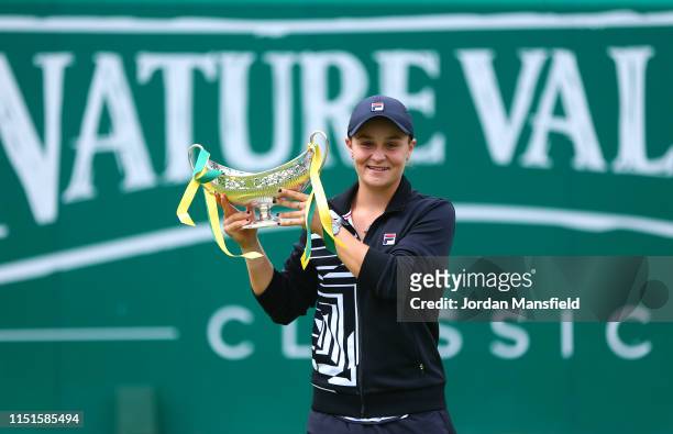 Ashleigh Barty of Australia poses with the trophy following her victory in the final match during day seven of the Nature Valley Classic at Edgbaston...