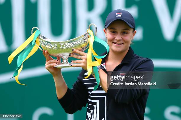 Ashleigh Barty of Australia poses with the trophy following her victory in the final match during day seven of the Nature Valley Classic at Edgbaston...