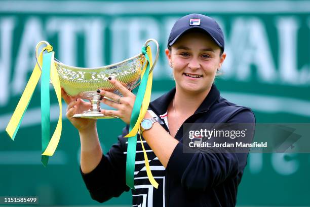 Ashleigh Barty of Australia poses with the trophy following her victory in the final match during day seven of the Nature Valley Classic at Edgbaston...