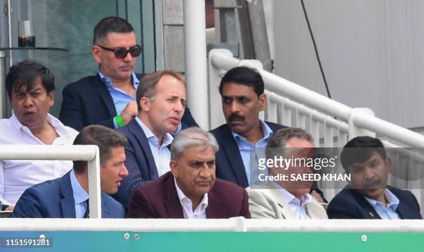 Pakistan Army Chief General Qamar Javed Bajwa looks on during the 2019 Cricket World Cup group stage match between Pakistan and South Africa at...