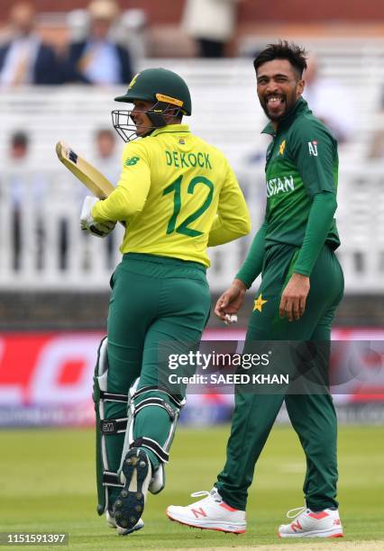 Pakistan's Mohammad Amir reacts after a delivery to South Africa's Quinton de Kock during the 2019 Cricket World Cup group stage match between...