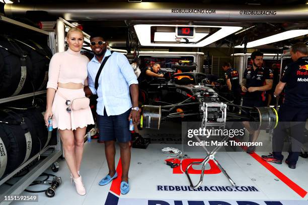 American skiing legend Lindsay Vonn and Canadian NHL player P.K. Subban pose for a photo outside the Red Bull Racing garage before qualifying for the...