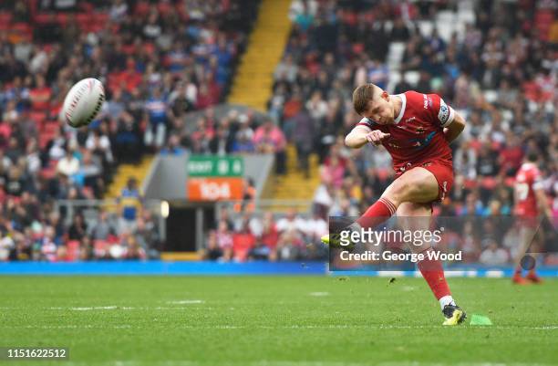 Oliver Russell of Huddersfield Giants converts a kick during the Hull FC v Huddersfield Giants - Betfred Super League matchat Anfield on May 25, 2019...