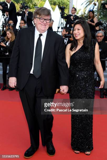 Michael Moore and Sonia Low attend the closing ceremony screening of "The Specials" during the 72nd annual Cannes Film Festival on May 25, 2019 in...