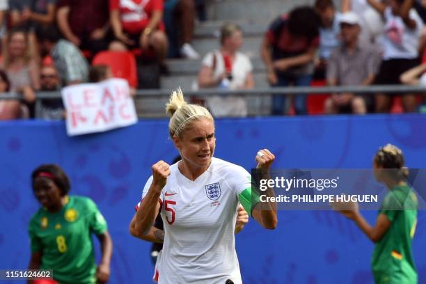 England's defender Steph Houghton celebrates after scoring a goal during the France 2019 Women's World Cup round of sixteen football match between...